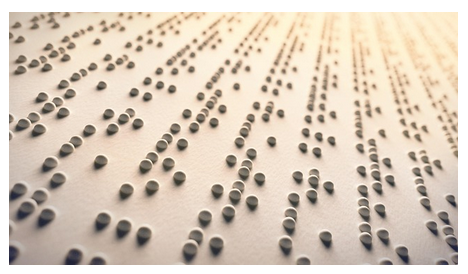 The image shows a zoom of a Braille page